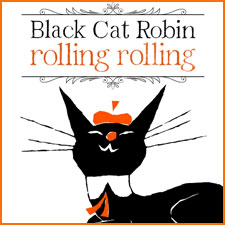 Black Cat Robin rolling rolling